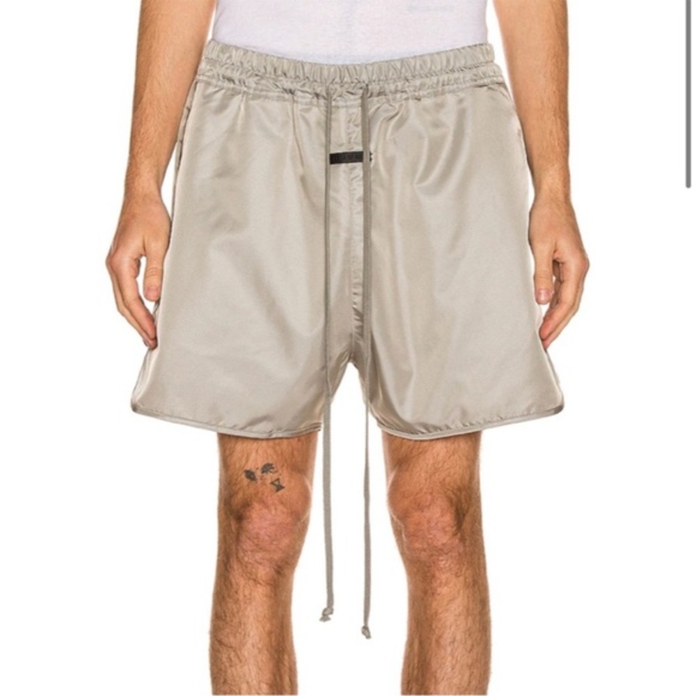 FEAR OF GOD ESSENTIALS Nylon Track Shorts in Silver